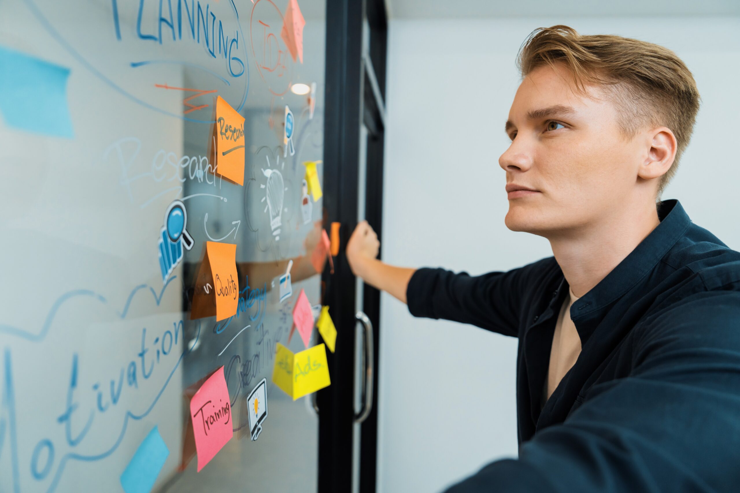 professional-businessman-brainstorm-idea-glass-white-board-immaculate